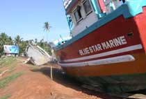 Battered boats left behind by the tsunami in Sri Lanka