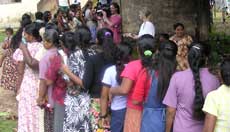 Tsunami victims line up to get relief