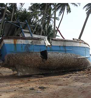 Boat in Sri Lanka damaged by a tsunami in 2004
