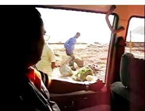 Driving by damage from a tsunami in Sri Lanka in 2004